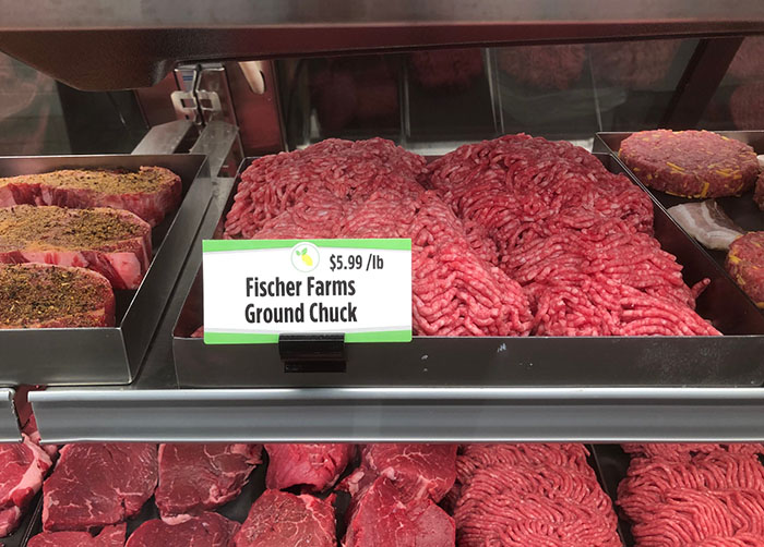 Various cuts of beef in display cooler