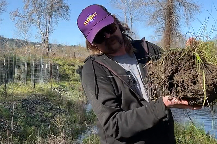 Person holding a mud sample