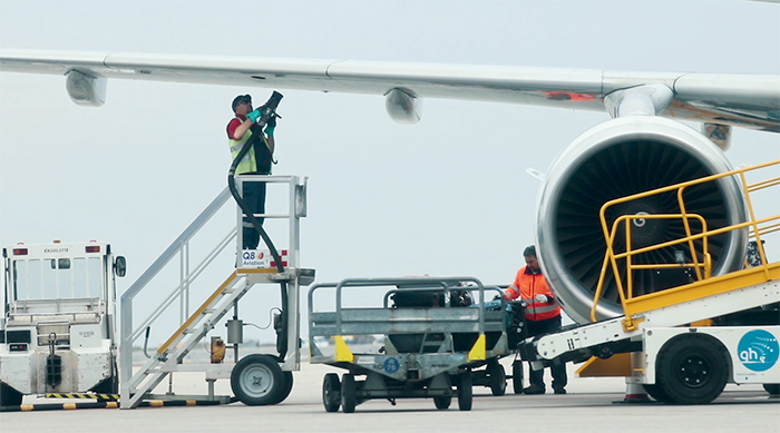 Person fueling an airplane